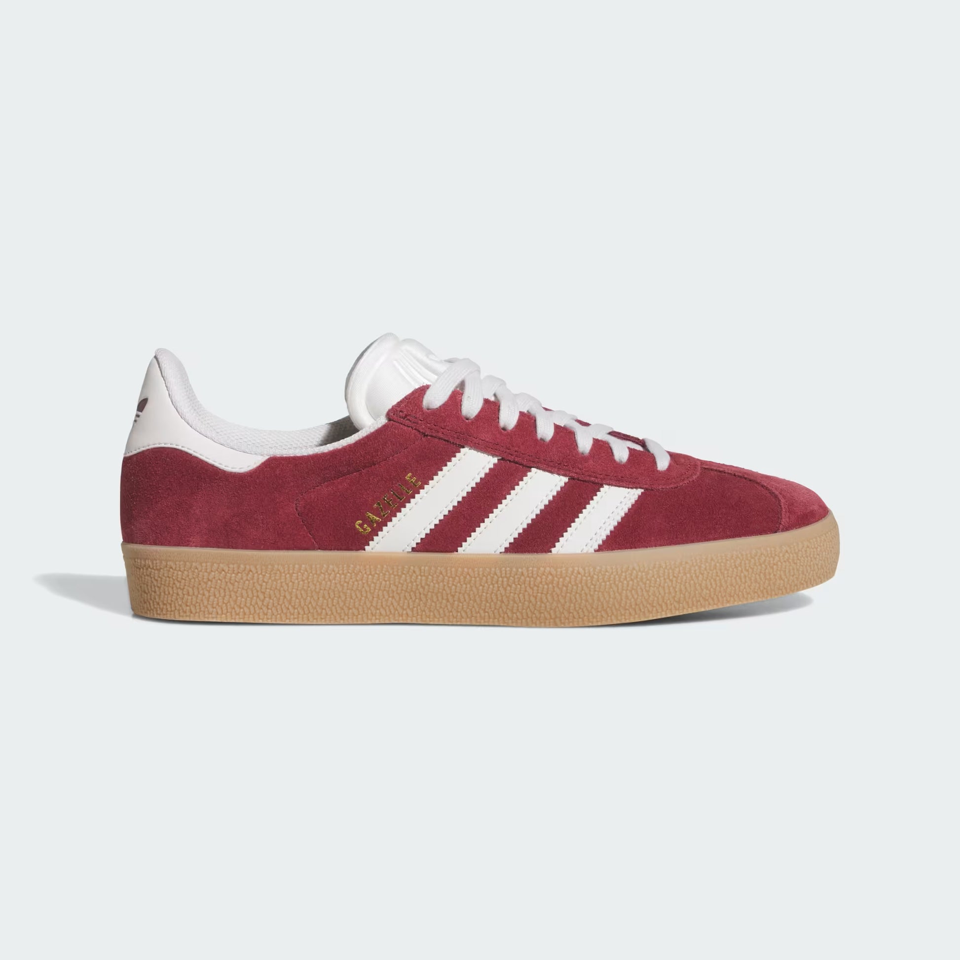 Side view of burgundy Adidas Gazelle ADV shoe with white stripes and gum  sole on light gray background