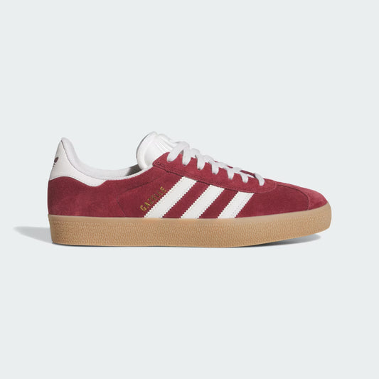 Side view of burgundy Adidas Gazelle ADV shoe with white stripes and gum  sole on light gray background